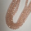 Mărgele din cristal cehesc roz deschis, fațetate, nuanță de «benzină», diametru 8x6 mm, lungime 39 mm +/- pe fir