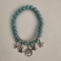 Brățară din turcoaz (artificial) cu bile netede, diametrul de 8 mm ±, cu inserții argintii, lungimea 18 cm ± (elastic)