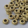Inserție pentru mărgele, diametru 7×3 mm, diametrul orificiului 2,8 mm, set 35 bucăți +/- culoare bronz metalic
