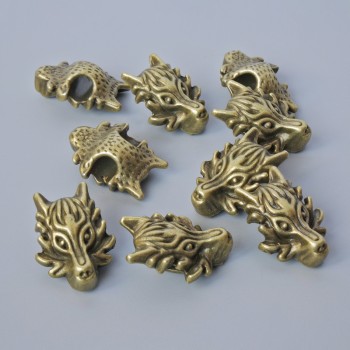 Inserție pentru mărgele «Dragon», dimensiuni 18×13×8 mm, diametrul orificiului 3,7 mm, set de 9 bucăți ± culoare bronz metalic