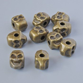 Inserție pentru mărgea «Craniu», dimensiuni 11×8×7 mm, diametrul găurii 2,6 mm, ambalaj 10 bucăți ± culoare bronz a metalului