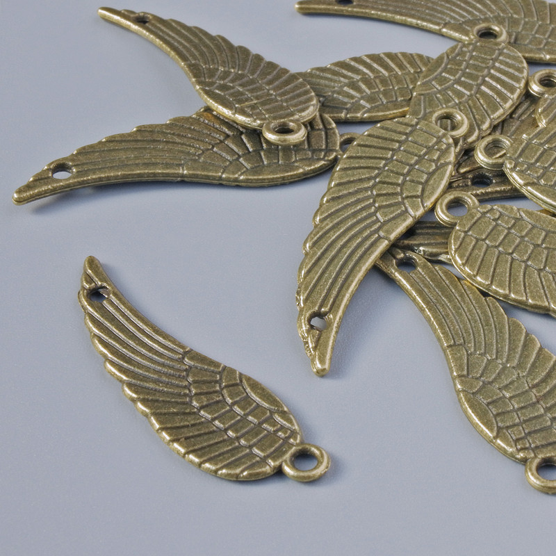 Furnitură pandantiv „Aripă”, diametrul 30×9 mm, diametrul găurii 1,6 mm, lot 15 buc. ±, culoare bronz a metalului