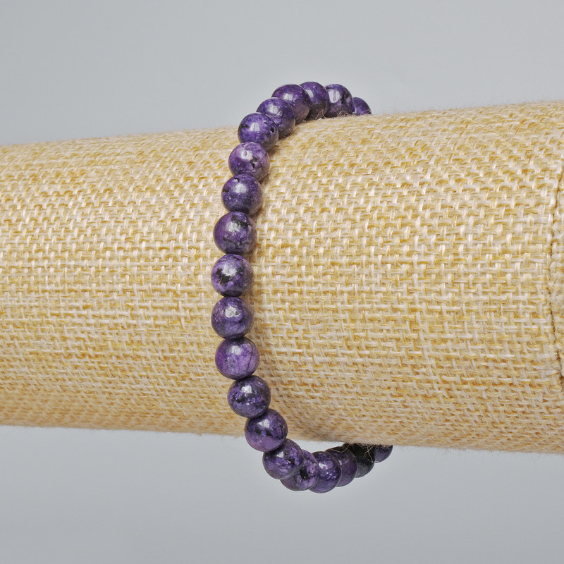 Brățară din sugilit (presat) bile netede, diametrul 6,5 mm, lungimea 18 cm (elastică)