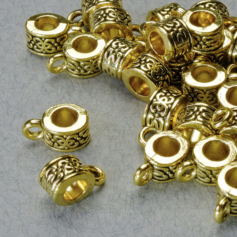 Furnituri – Ținător de bail, diametrul 6×5 mm, găuri de 1,8 mm și 3,7 mm, lungimea 10 mm, culoare aurie a metalului, ambalaj 20 g ± 30 buc.