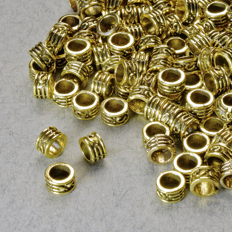 Furnitură mărgea-inserație, dimensiuni 3x5 mm, gaură Ø 3,3 mm, culoare aurie a metalului, ambalaj 20 g ± 140 buc.