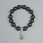 Brățară șungit (artificial) cu mărgele netede, diametrul 12 mm +/- (elastică), lungimea 18 cm +/- cu inserții de hematit