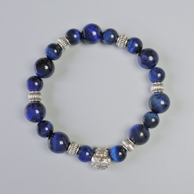 Brățară cu ochi de pisică de culoare albastră, bile netede, diametre aproximativ 10,5 mm și 8,5 mm, lungime 18 cm +/-, cu inserții metalice, pe bandă elastică