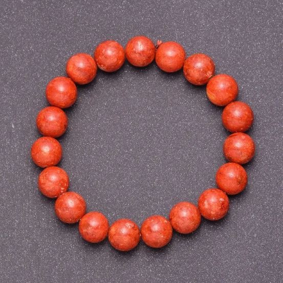 Brățară din coral poros, cu mărgele netede, diametru aproximativ 12 mm, lungime 18 cm (elastică)