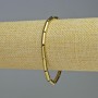 Brățară din hematit cilindric, culoare aurie, diametrul 12×4 mm, lungimea 18 cm, cu elastic