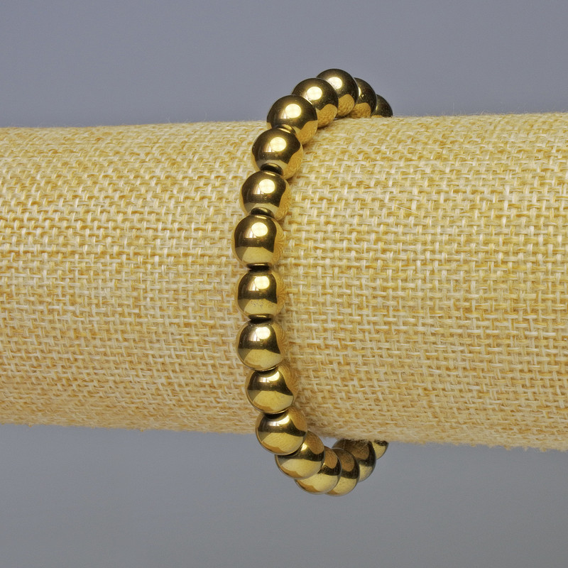 Brățară hematit cu bile netede, culoare aurie, diametru 8 mm ±, lungime 18 cm ±, pe bază elastică