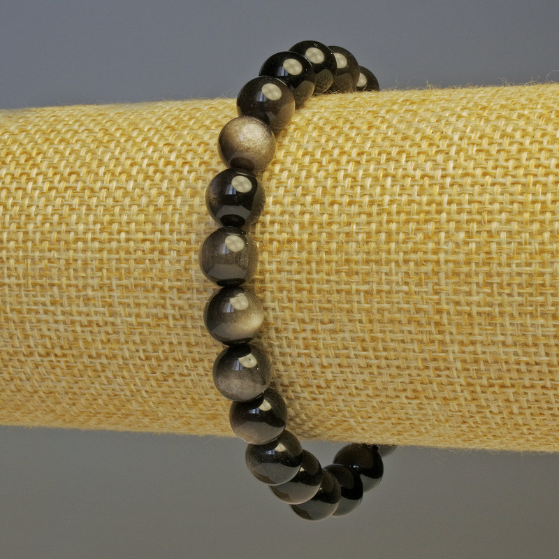 Brățară din obsidian argintiu, bile netede, diametrul de aproximativ 8 mm, lungime 18 cm, pe elastic