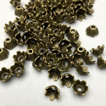 Capace pentru mărgele, culoare bronz metalic, diametru 7×1 mm ±, gaură de aproximativ 2 mm ±, ambalaj (~32 buc.)