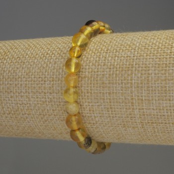 Brățară din chihlimbar, bile lucioase, diametrul 6–6,5 mm, lungime 18 cm, elastic