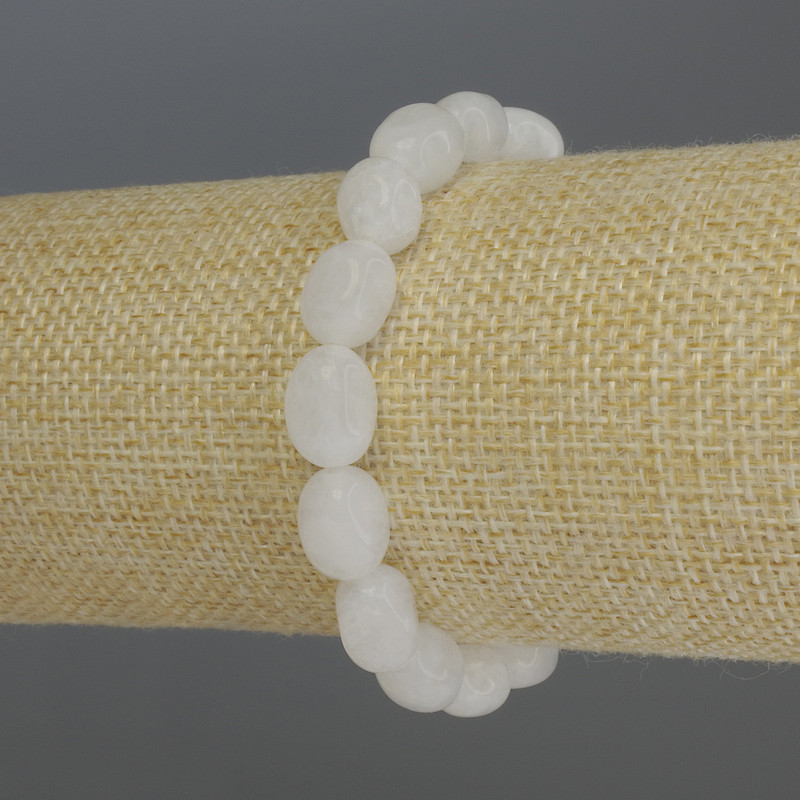 Brățară cu cuarț alb, margele tăiate în fațete, diametrul 9–12×8 mm, lungime 18 cm, pe elastic