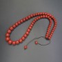 Colier din coral artificial, rondel neted, diametru 10–16 mm, în creștere spre centru, lungime 66 cm, șnur reglabil