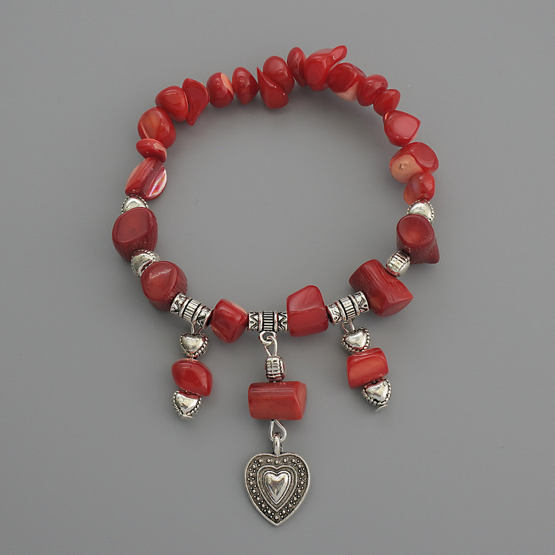 Brățară din sidef fațetată, diametrul 6×8 mm +/-; coral cilindric 12×7 mm +/-; lungime 18 cm, elastică