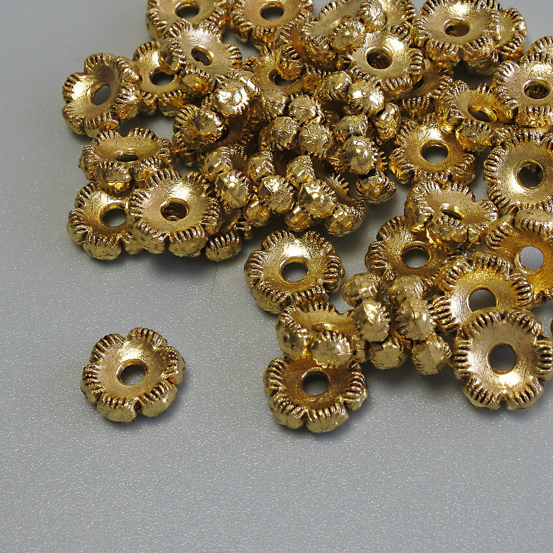 Mărgea-inserație, culoare metalică aurie, diametru 7×3 mm, gaură de aproximativ 1,9 mm, ambalaj 20 g (~44 buc.)