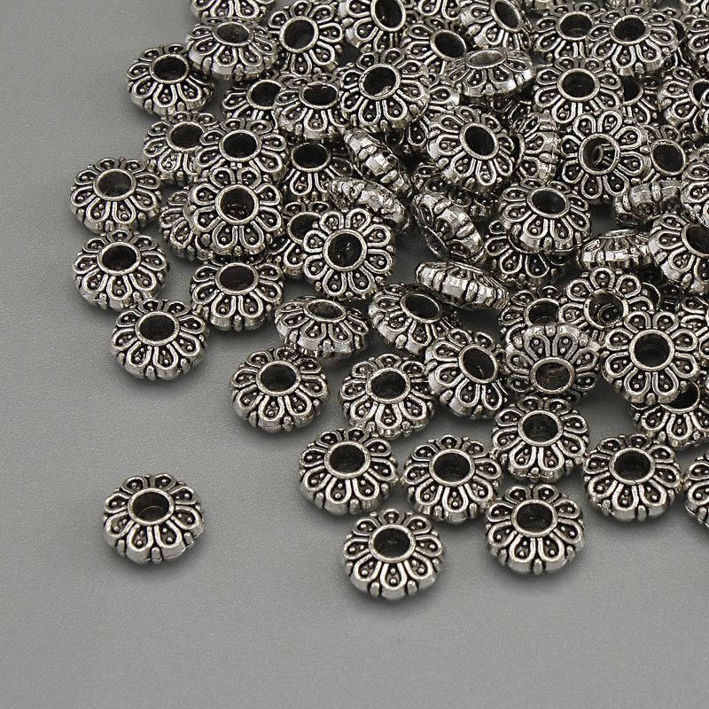 Furnitură mărgea-inserație, culoare metal argintiu, diametru 6×2,5 mm, gaură de 2 mm, ambalare 20 g (~94 buc.)
