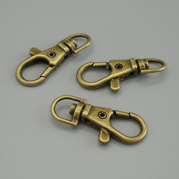 Preț pentru pachet / 10 buc. Închizătoare carabină, diametru 38x18 mm, culoare bronz