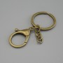 Preț per pachet / 10 buc. Bază pentru breloc cu două prinderi: carabină 33×24 mm și inel, diametrul 3 cm, lungimea 7 cm