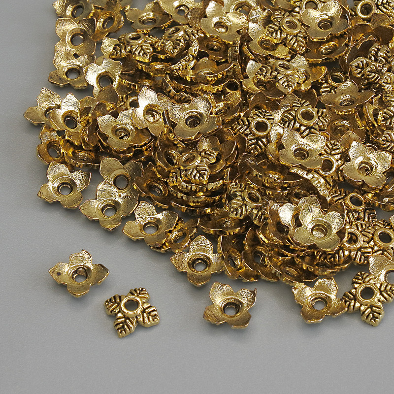 Capace pentru mărgele, culoare aurie metalică, diametru 5×1 mm ± gaură 1 mm ± ambalare 20 g (~160 buc.)