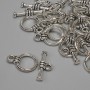 Închizătoare toggle, diametru 15×3 mm ± cerc, diametru 9,5 mm ±, diametru orificiu 7 mm ±, culoare argintiu metal, lot de 15 bucăți