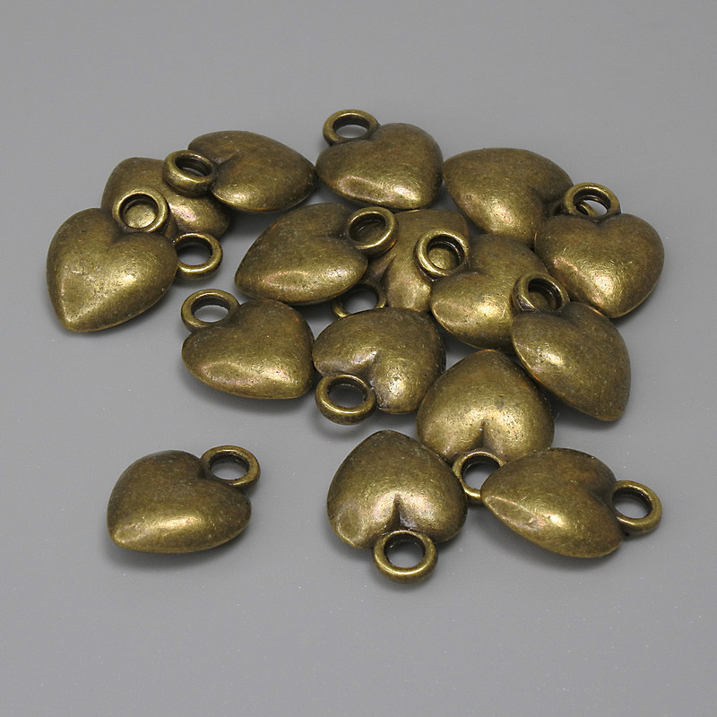 Pandantiv inimă, culoare bronz, diametru 12x9 mm ±, gaură pentru cercei 2,4 mm ±, ambalaj 16 buc.