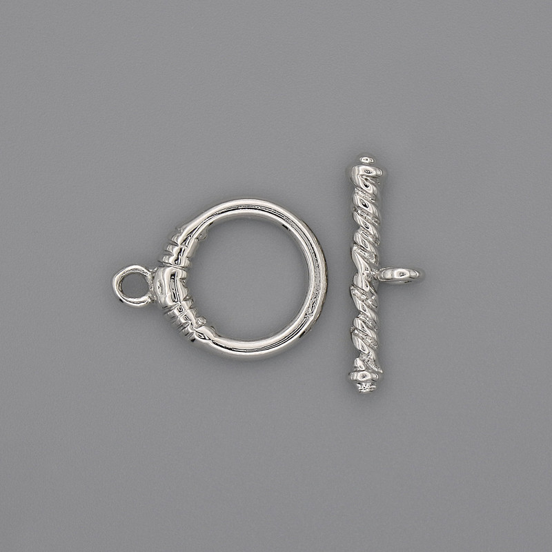 Furnitură închizătoare toggle, diametru 23x3,5 mm +/- cerc, diametru 14 mm +/-, diametru orificiu 10 mm +/-, culoare argintie a metalului