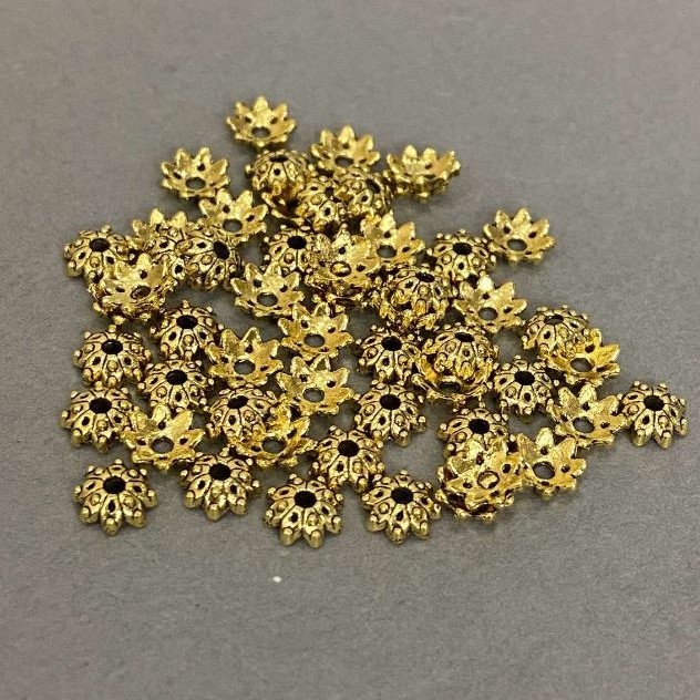 Capace pentru mărgele, culoare aurie, diametru 5,5×1 mm ± gaură 1,3 mm ± ambalaj 20 g (~155 buc.)