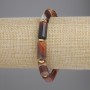 Brățară din agat cilindric, diametrul aproximativ 15×8 mm ±, cu inserții metalice, lungime aproximativă 18 cm ±, pe bază elastică