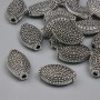 Furnitură – mărgea-inserație, culoare metalică argintie, diametru 12,5×7 mm, gaură de aproximativ 1,7 mm, ambalaj de aproximativ 20 g, circa 15 buc.