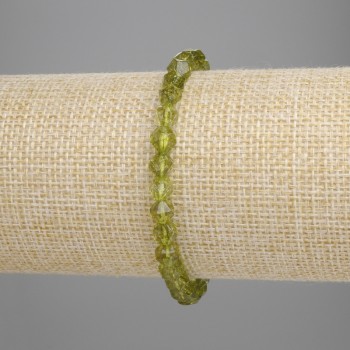 Brățară cu crizolit multifacetat, diametru aproximativ 5×5 mm, lungime 18 cm, pe elastic