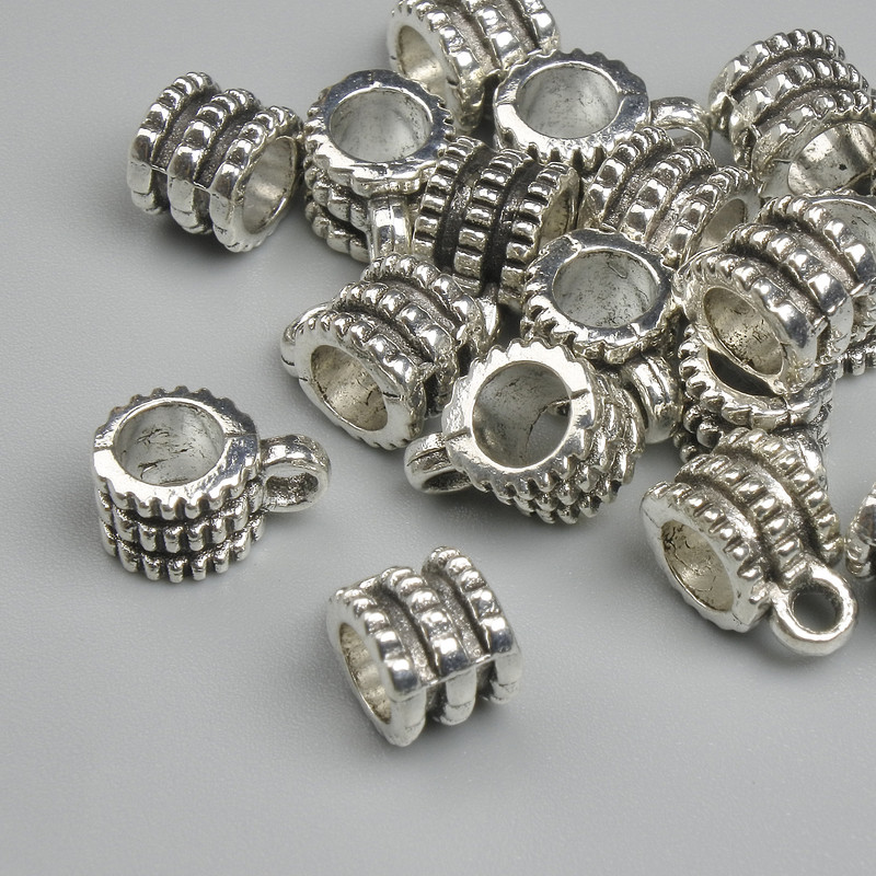 Bail argintiu pentru bijuterii, dimensiuni 6,5×9,5 mm, găuri de 2,2 mm și 4,6 mm, ambalaj 18 buc.