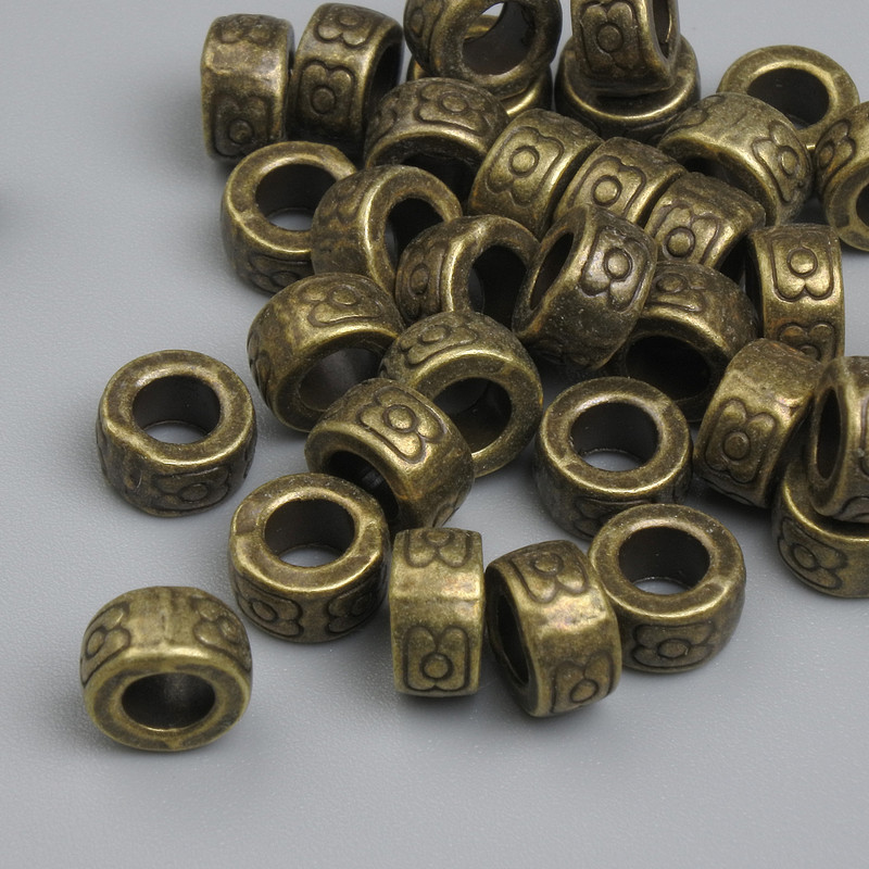Furnitură – mărgea inserție culoare bronz, diametrul 6,5×3,5 mm, gaură Ø aproximativ 4 mm, ambalaj 20 g ~ 35 buc.