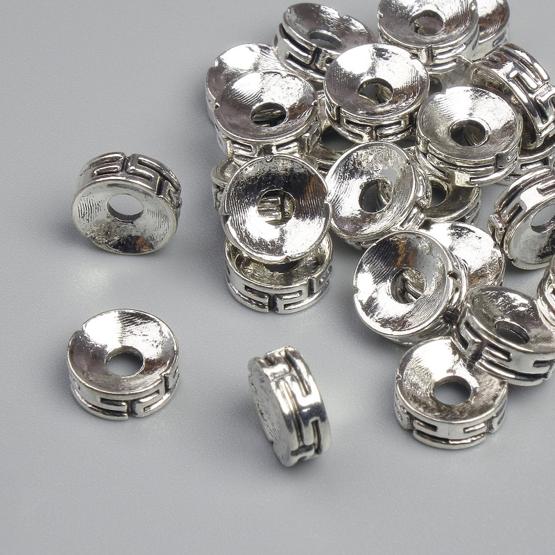 Furnitură mărgea-inserație, culoare argintie, diametru 7×3 mm ±, gaură aproximativă de 2,2 mm ±, ambalare ~28 buc.