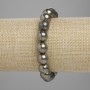 Brățară din pirită, mărgele lucioase, diametrul 10 mm ±, lungimea 18 cm ±, pe elastic