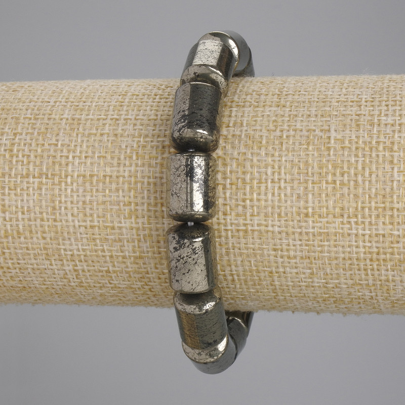 Brățară din pirită în formă de cilindri, diametru 14×10 mm +/- lungime 18 cm +/- pe elastic