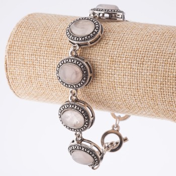 Reducere: Brățară cu cuarț roz, montură în formă de «punct-cruce», piatră ovală 22×18 mm, 7 buc., lungime 20–22 cm