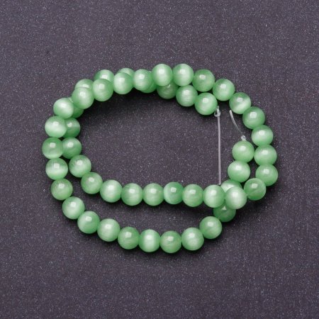 Mărgele din piatră naturală pe șnur «ochi de pisică» verde deschis, diametrul 8 mm, lungimea 37 cm