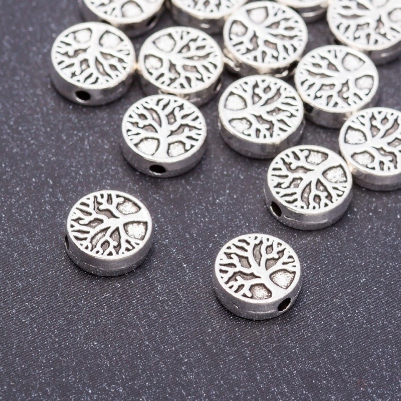 Inserție din lemn pentru mărgele, diametru 9x3 mm, ambalaj 20 g ± 17 buc.