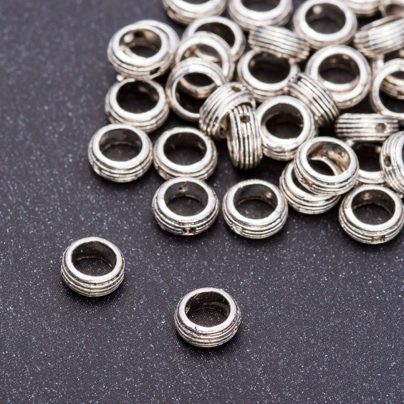 Inserție mărge Pandora – inel, diametru 7×3 mm, gaură 5 mm, ambalare 20 g +/- 75 buc