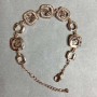Brățară din metal auriu cu strasuri albe, diametrul elementelor decorative 12 mm, lungime 16 mm + lanț extensor de 3 cm