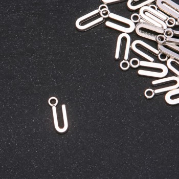 Furnitură pandantiv Litera 'U' 17×7 mm ambalaj 20 g (+/- 30 buc.)
