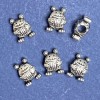 Mărgea «Broască» 10x14mm, gaură de 5mm, ambalaj 20 g ± 8 bucăți