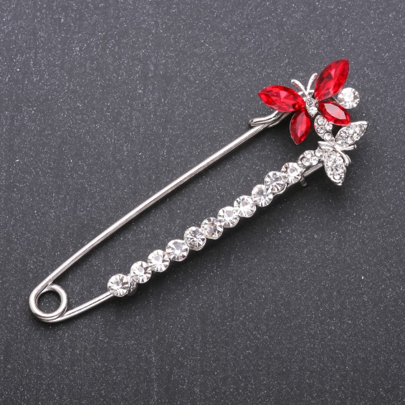 Broșă cu ac din cristale roșii, 78×24 mm, metal alb