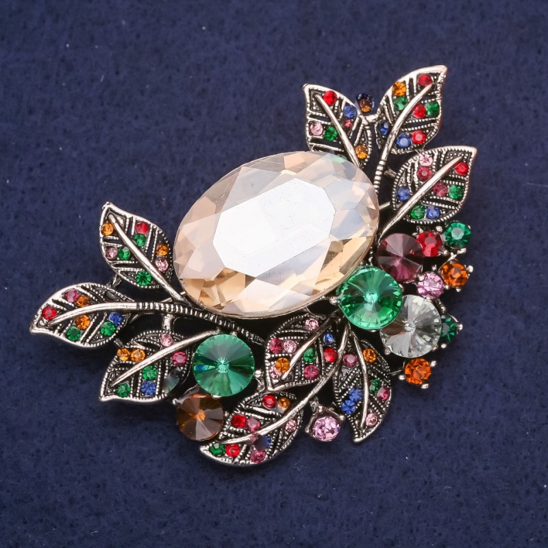 Broșă mare Accent în design vegetal cu strasuri și piatră multicoloră, 67×45 mm, metal argintiu