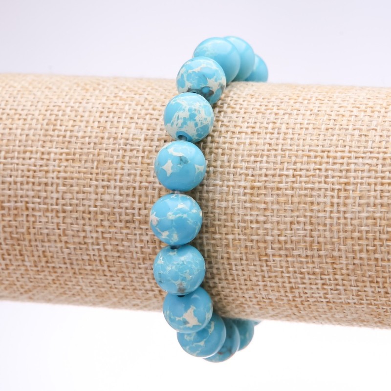 Brățară cu varisit (presat), bile albastre lucioase, diametrul de 10 mm, lungimea 18 cm, pe elastic