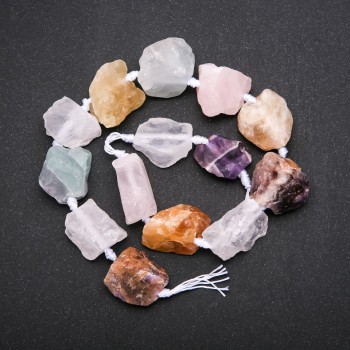 Mărgele brute «Asortiment» — bază pe șnur, diametrul 20×26 mm, lungime 42 cm