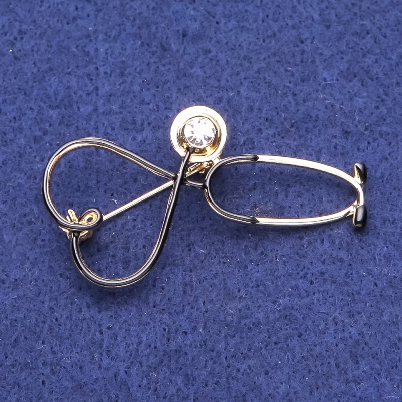 Broșă «Stetoscop» cu strasuri, email negru, 24×25 mm, metal auriu