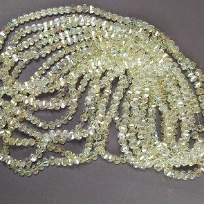 Mărgele de cristal galbene în stil Swarovski, tăiate multifacetate, cu luciu galben petrol, diametrul 5x4 mm, pe șnur de 48 cm